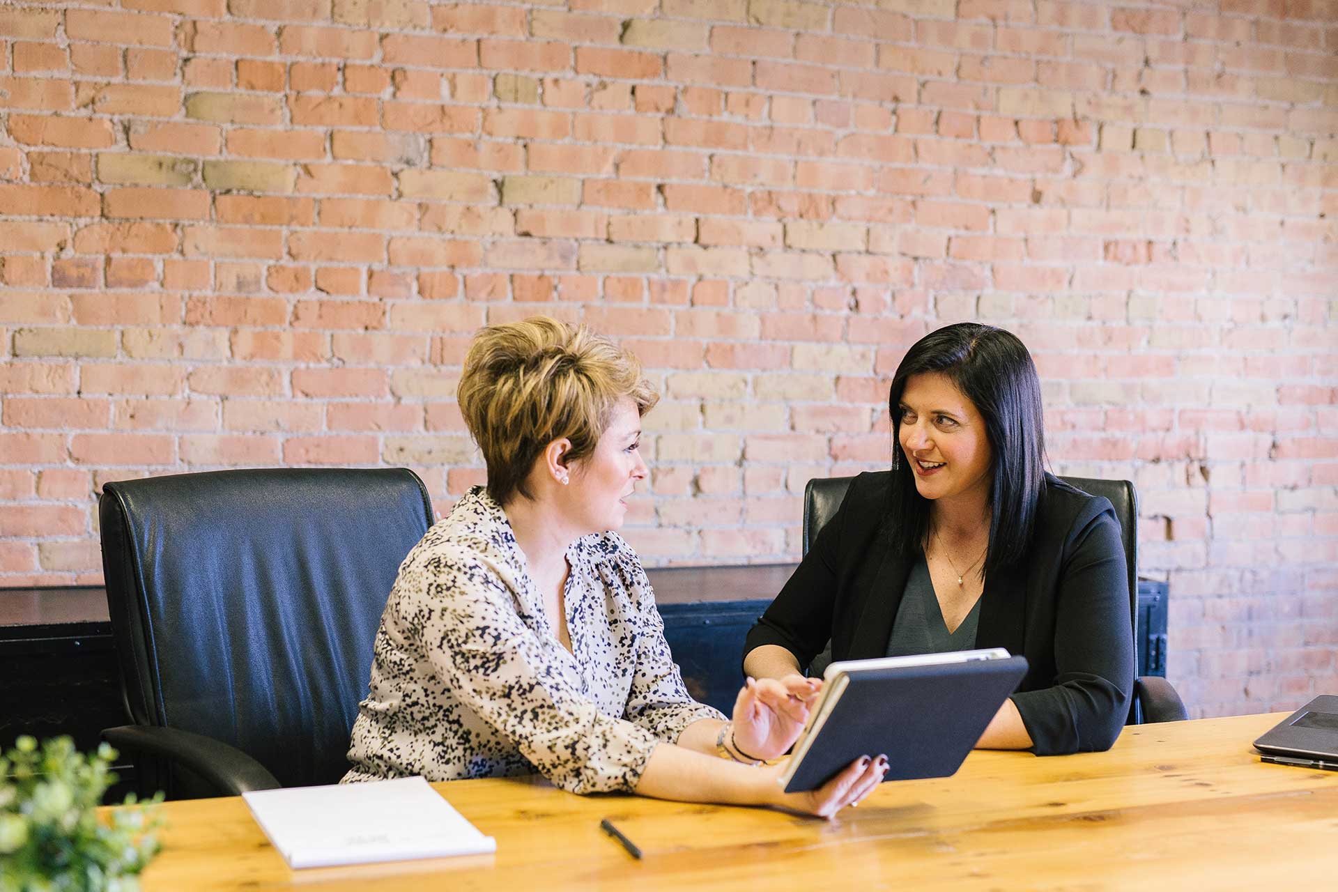 Woman in meeting stock (Credit Amy Hirschi)